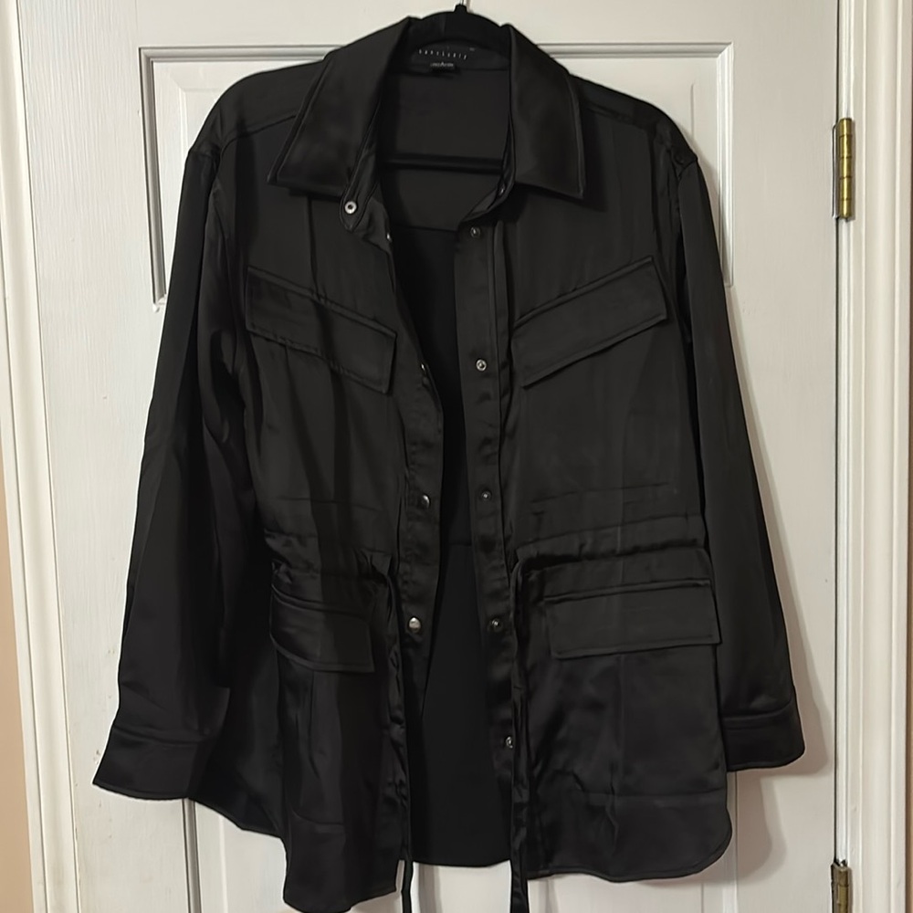 Woman’s satin black blazer or top size small. Over sized.